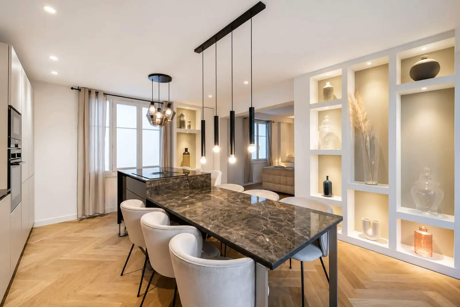 Dining table with marble top and lit display shelving