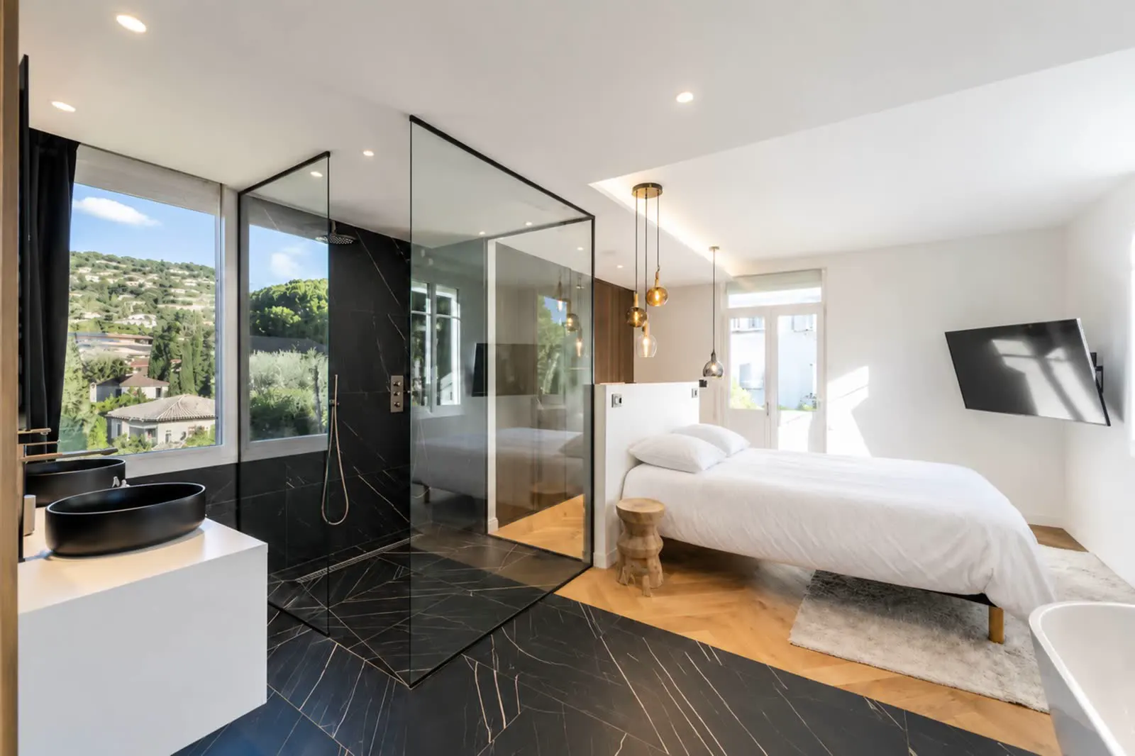 Master suite with black marble shower