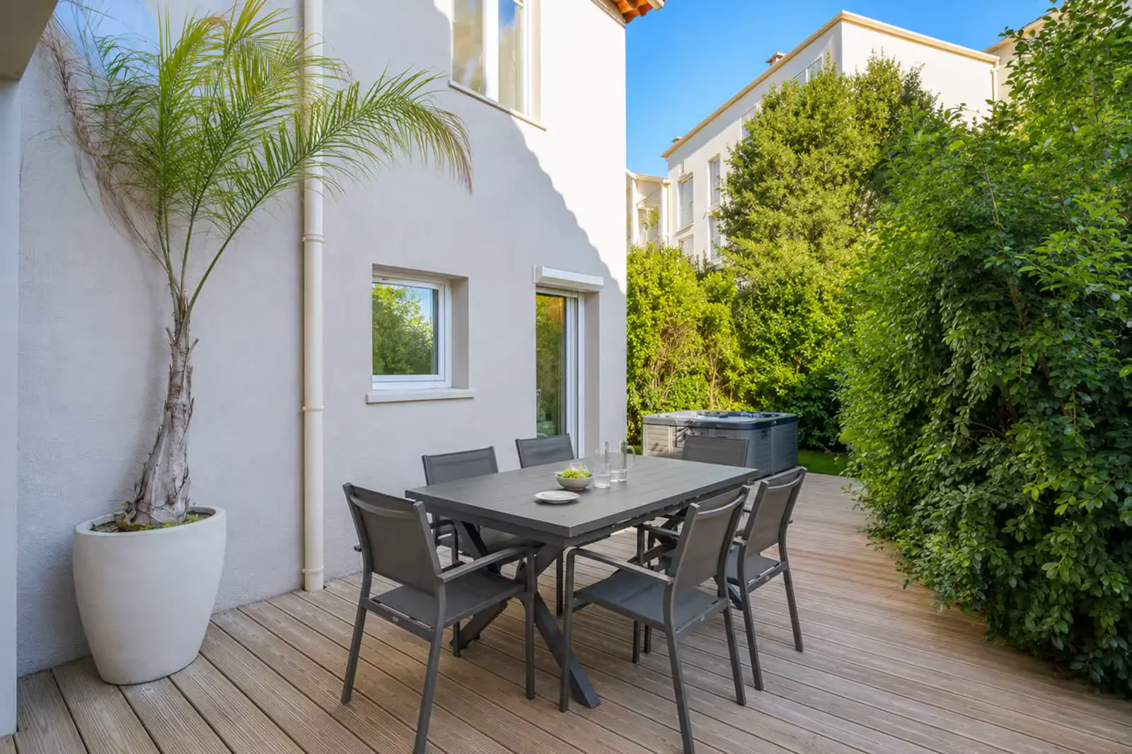 Outdoor dining table on the wood deck